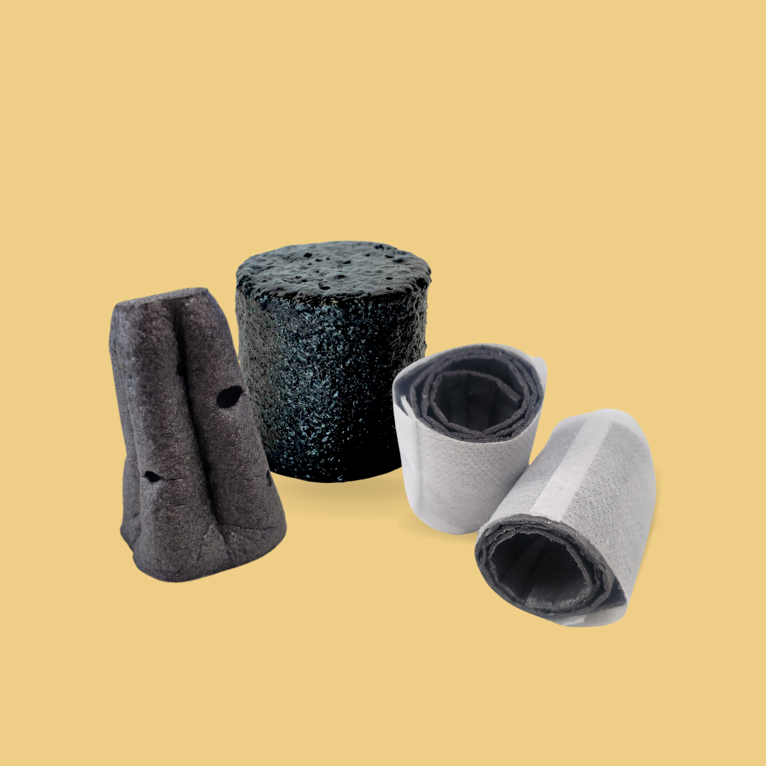 A collection of three different types of GelPonics plugs, designed for use in hydroponic and aeroponic systems, displayed against a light beige background. On the left, there's a dark gray plug with two holes, resembling a split design to accommodate plant stems or roots, suggesting its use in supporting young plants or cuttings. The center features a cylindrical plug, textured with numerous small pores to enhance moisture retention and aeration, crucial for root development. On the right, there are two rolled plugs, one partially unrolled to show its flexible fabric-like material, indicating they can be adjusted to fit various plant sizes or systems. Each plug is crafted from non-synthetic hydrogel formulations, emphasizing sustainability and efficiency in modern agricultural practices.